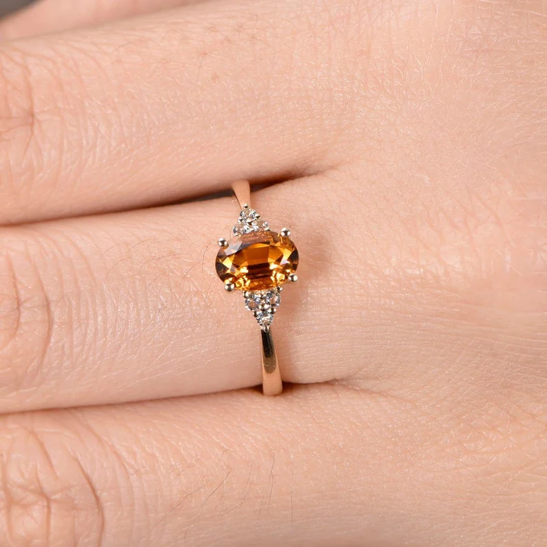 women men’s solitaire engagement rings -Cluster Yellow Oval Cut Citrine And Three Sidestone Moissanite Engagement Ring