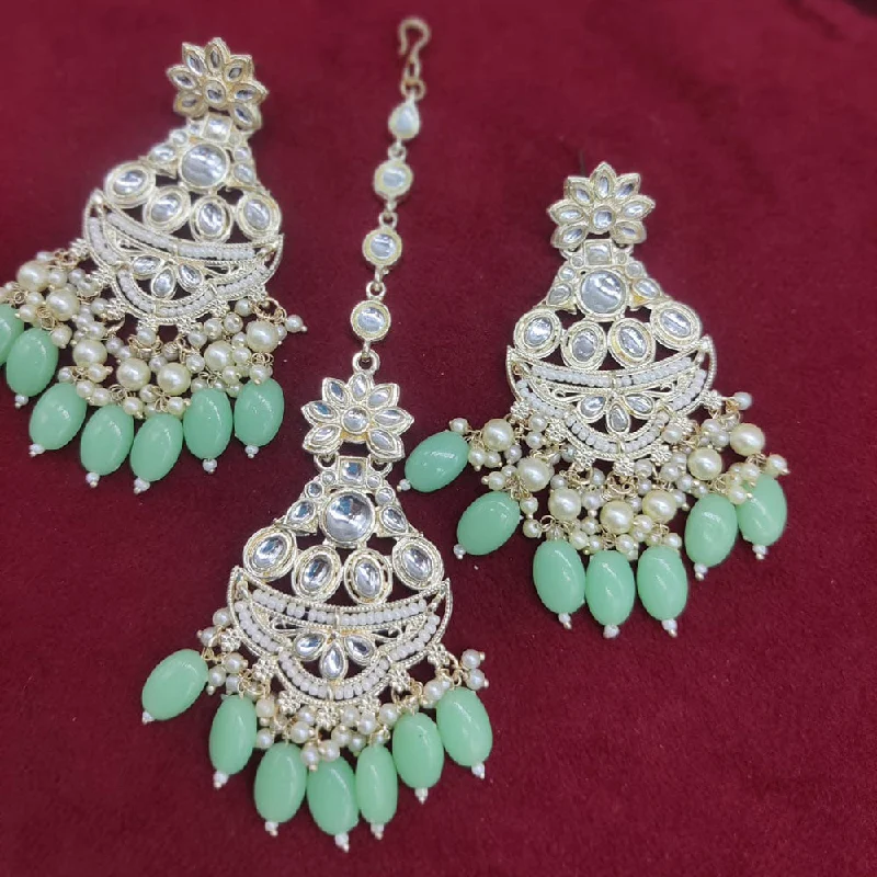 women gold-plated earrings -Manisha Jewellery Gold Plated Kundan Stone And Pearls Earrings With Maangtikka